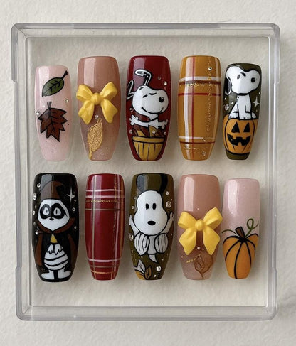 Autumn Snoopy press-on Nails: Fall Leaves, Pumpkins and Bows.