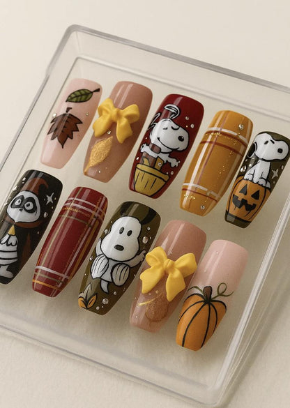 Autumn Snoopy press-on Nails: Fall Leaves, Pumpkins and Bows.