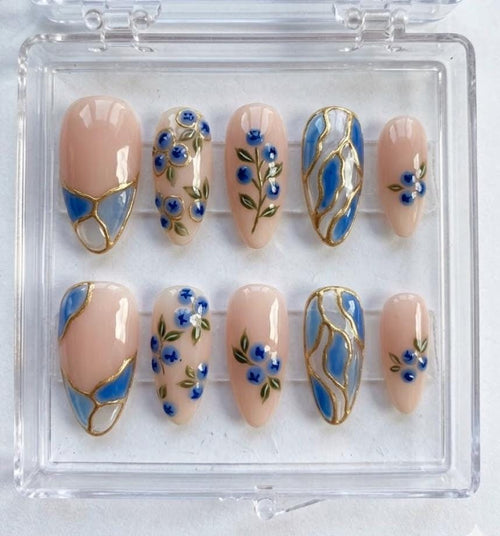 Blue Floral Stained Glass press-on Nails; Elegant Nude Gold Nails.
