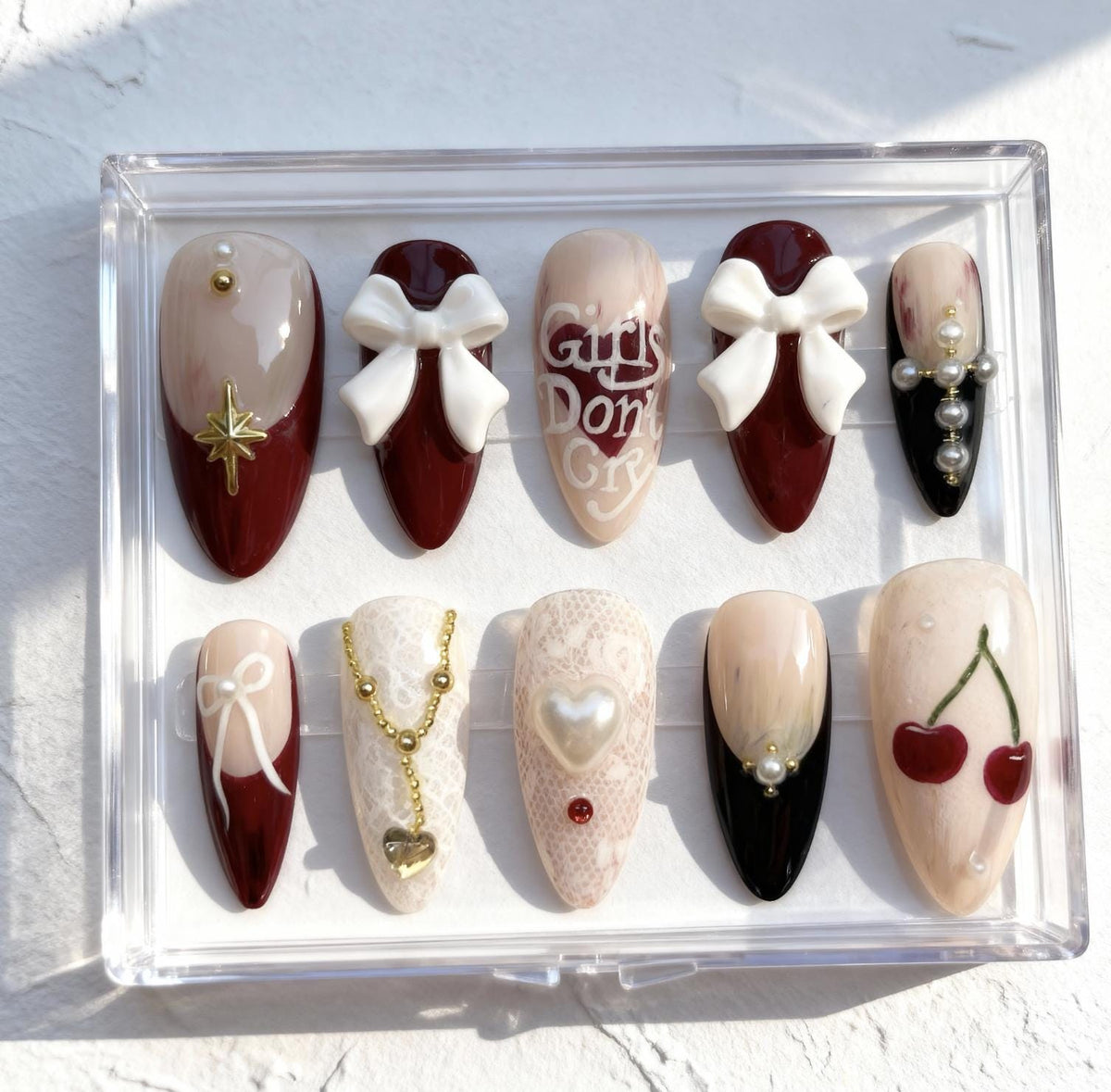 Cherry Valentine press-on Nails; Romantic Bow and Pearl Nails.