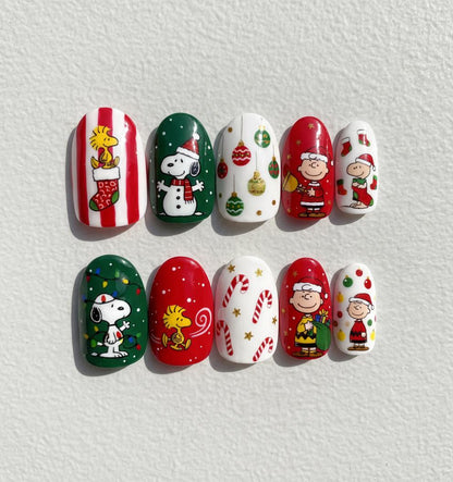 Christmas Snoopy press-on Nails; Charlie Brown Holiday Nail Art.