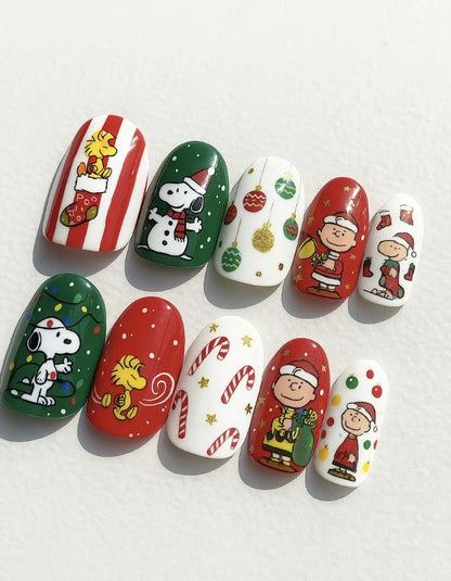 Christmas Snoopy press-on Nails; Charlie Brown Holiday Nail Art.