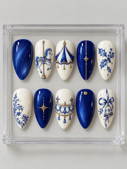 AI design mockup: Ten cobalt and ivory Christmas press-on nails with carousel horse, striped canopy, blue holly, bell and gold-colour accents.