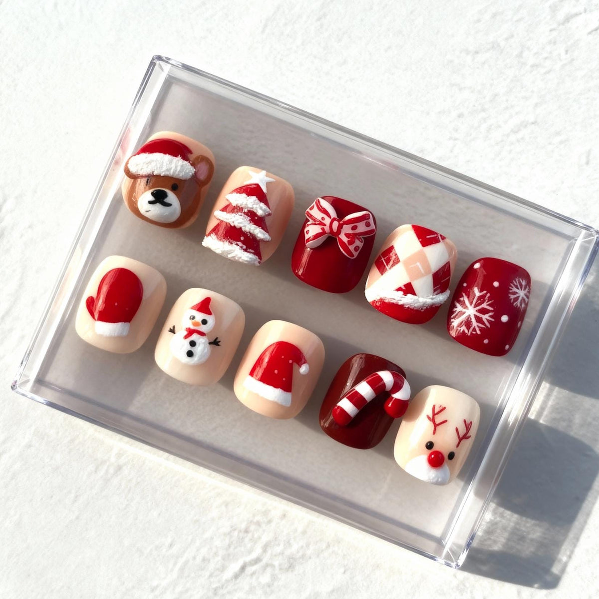 Cute Christmas press-on Nails; Red and Cream Holiday Nail Set with 3D Santa, Reindeer, and Snowman.