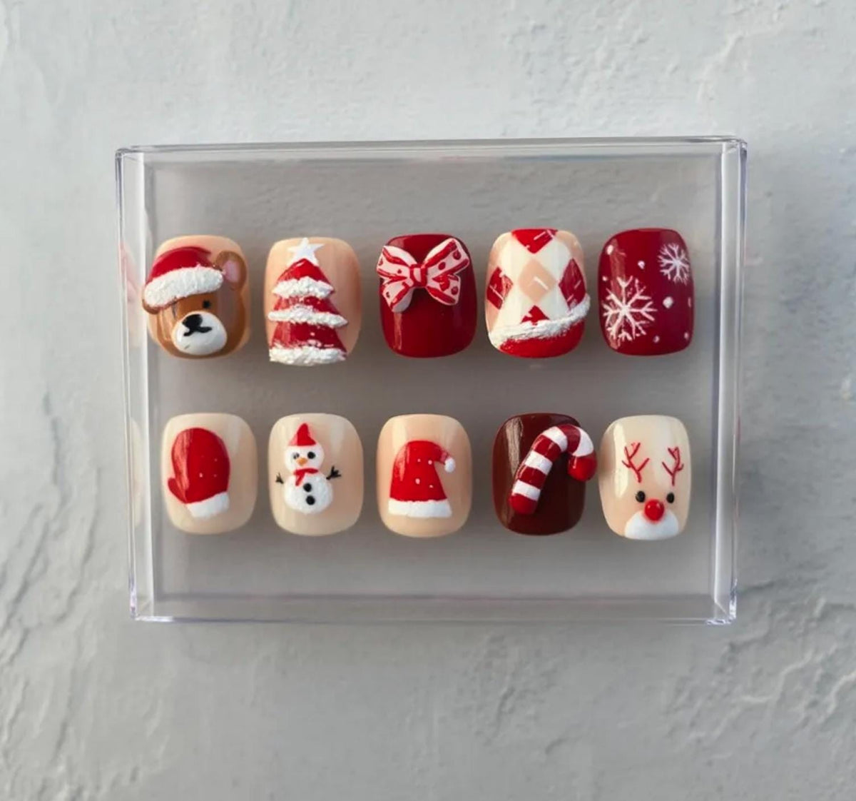Cute Christmas press-on Nails; Red and Cream Holiday Nail Set with 3D Santa, Reindeer, and Snowman.