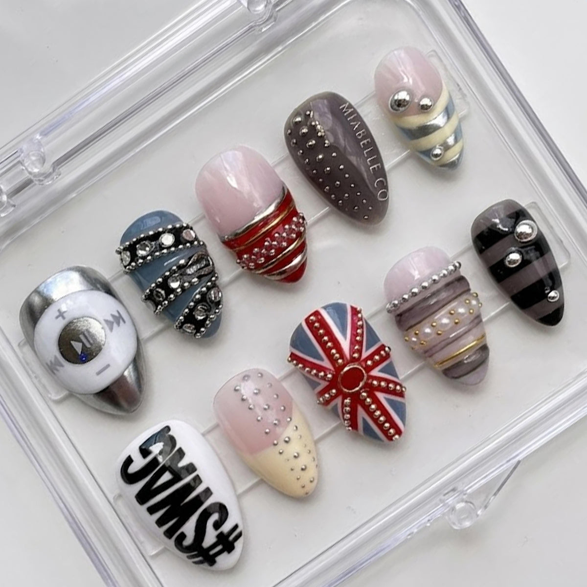 Edgy Mixed Design press-on Nails, Chrome Studded Nails, Punk Glam Nails, Union Jack Inspired Nails, Statement Almond Nails.