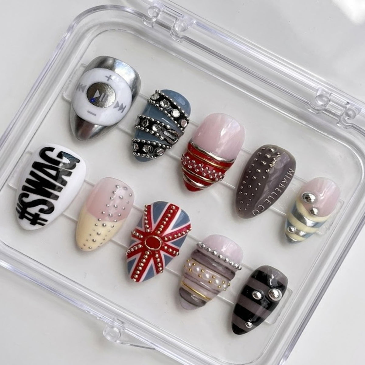 Edgy Mixed Design press-on Nails, Chrome Studded Nails, Punk Glam Nails, Union Jack Inspired Nails, Statement Almond Nails.