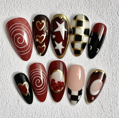 Glam Gothic press-on Nails: Red Black Gold Nail Art.