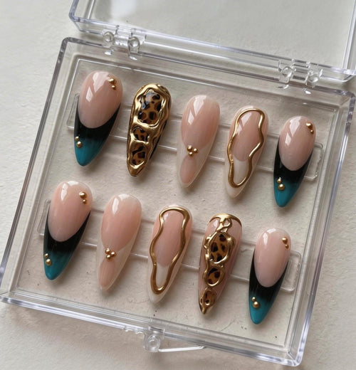 Gold Chrome Leopard press-on Nails; Nude French Tip Nails.
