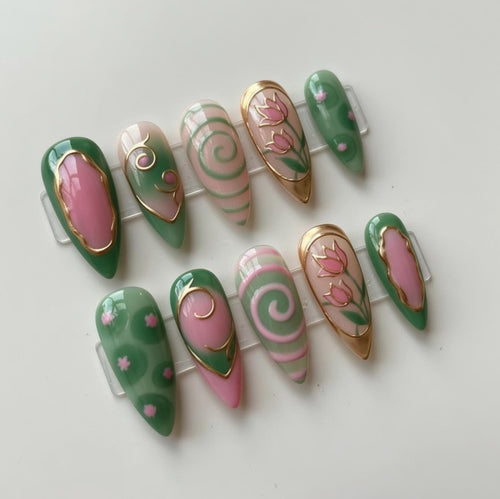 Green Pink Floral press-on Nails; Stained Glass Swirl Nails.