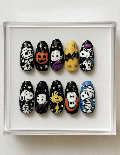 Halloween press-on Nails; Cute Peanuts Cartoon Nails with Ghost, Pumpkin, Mummy and Woodstock.