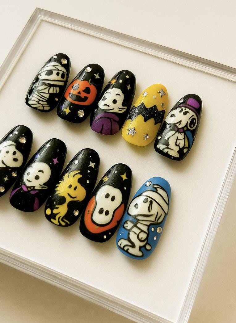 Halloween press-on Nails; Cute Peanuts Cartoon Nails with Ghost, Pumpkin, Mummy and Woodstock.