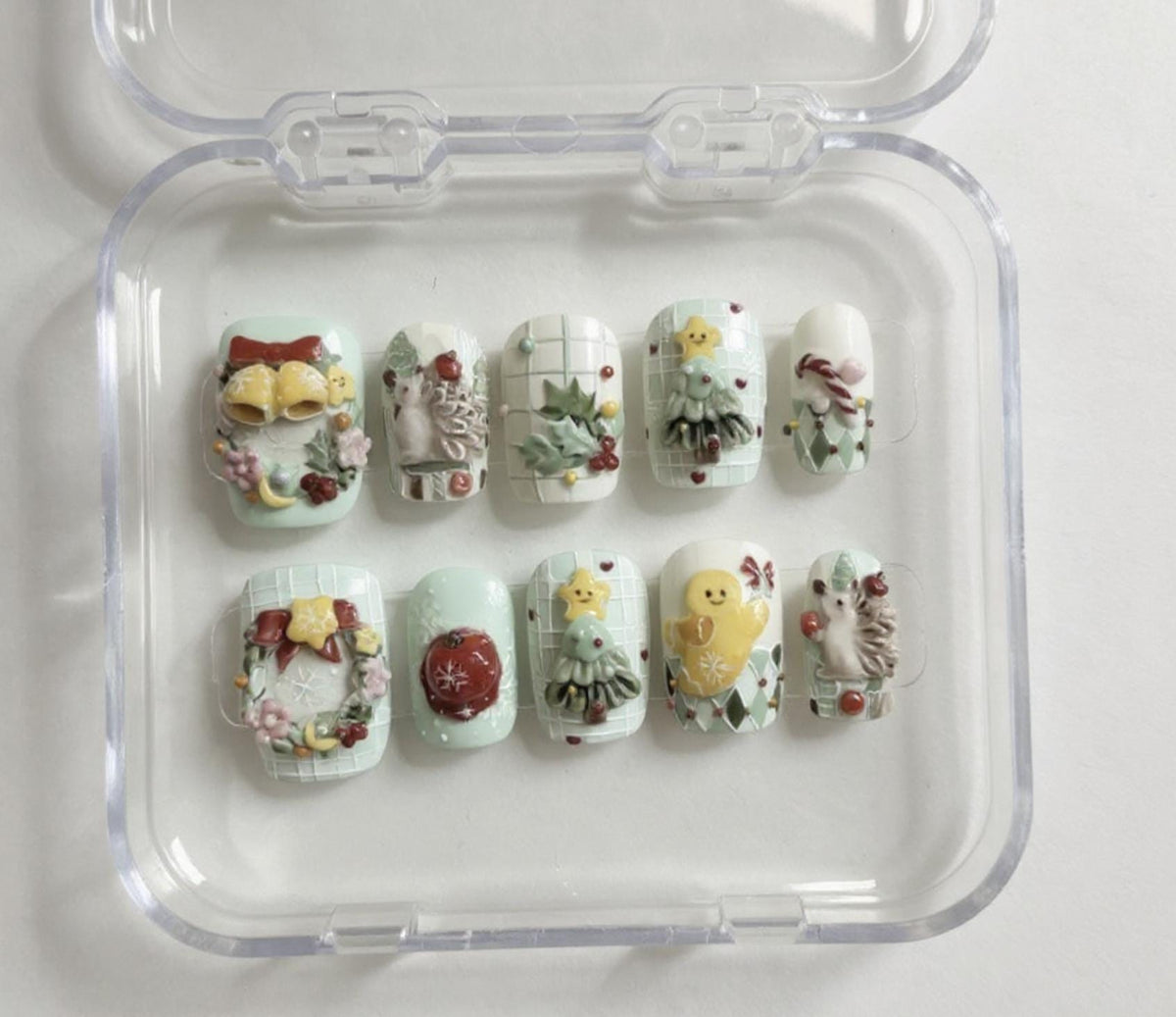 Handmade 3D Christmas press-on Nails: Pastel Kawaii Holiday Nail Art.