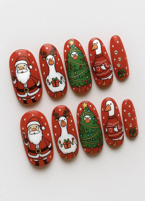 Handmade Christmas press-on Nails: Silly Goose Holiday Nail Art.