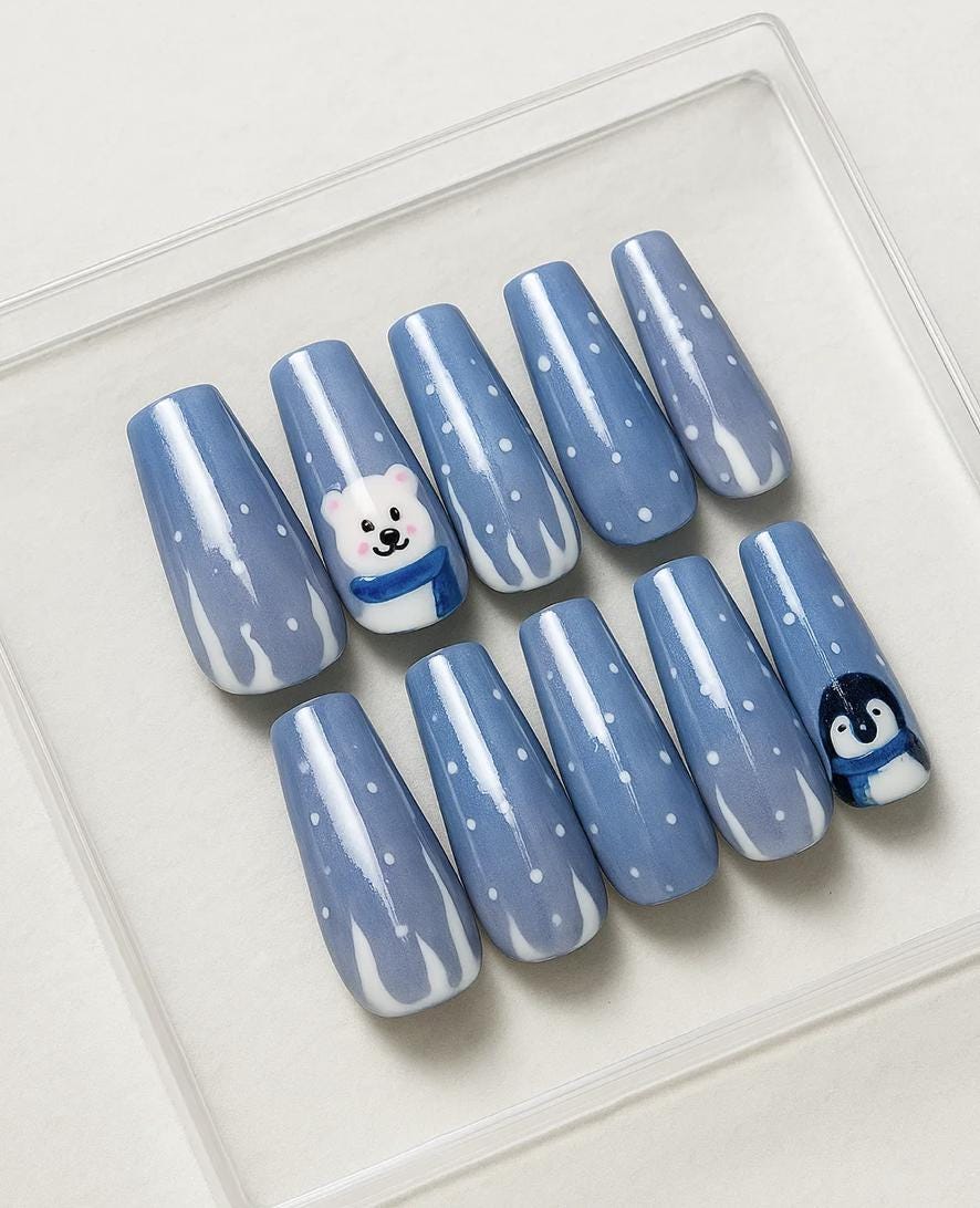 Handmade Winter press-on Nails: Polar Bear and Penguin Holiday Nail Art.