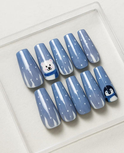 Handmade Winter press-on Nails: Polar Bear and Penguin Holiday Nail Art.