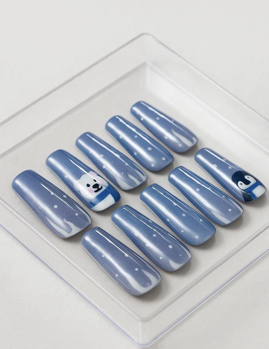 Handmade Winter press-on Nails: Polar Bear and Penguin Holiday Nail Art.