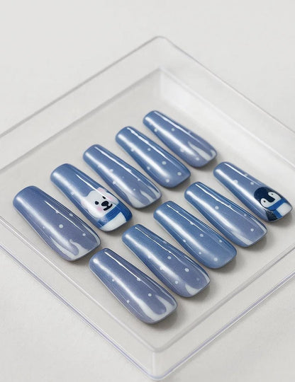 Handmade Winter press-on Nails: Polar Bear and Penguin Holiday Nail Art.