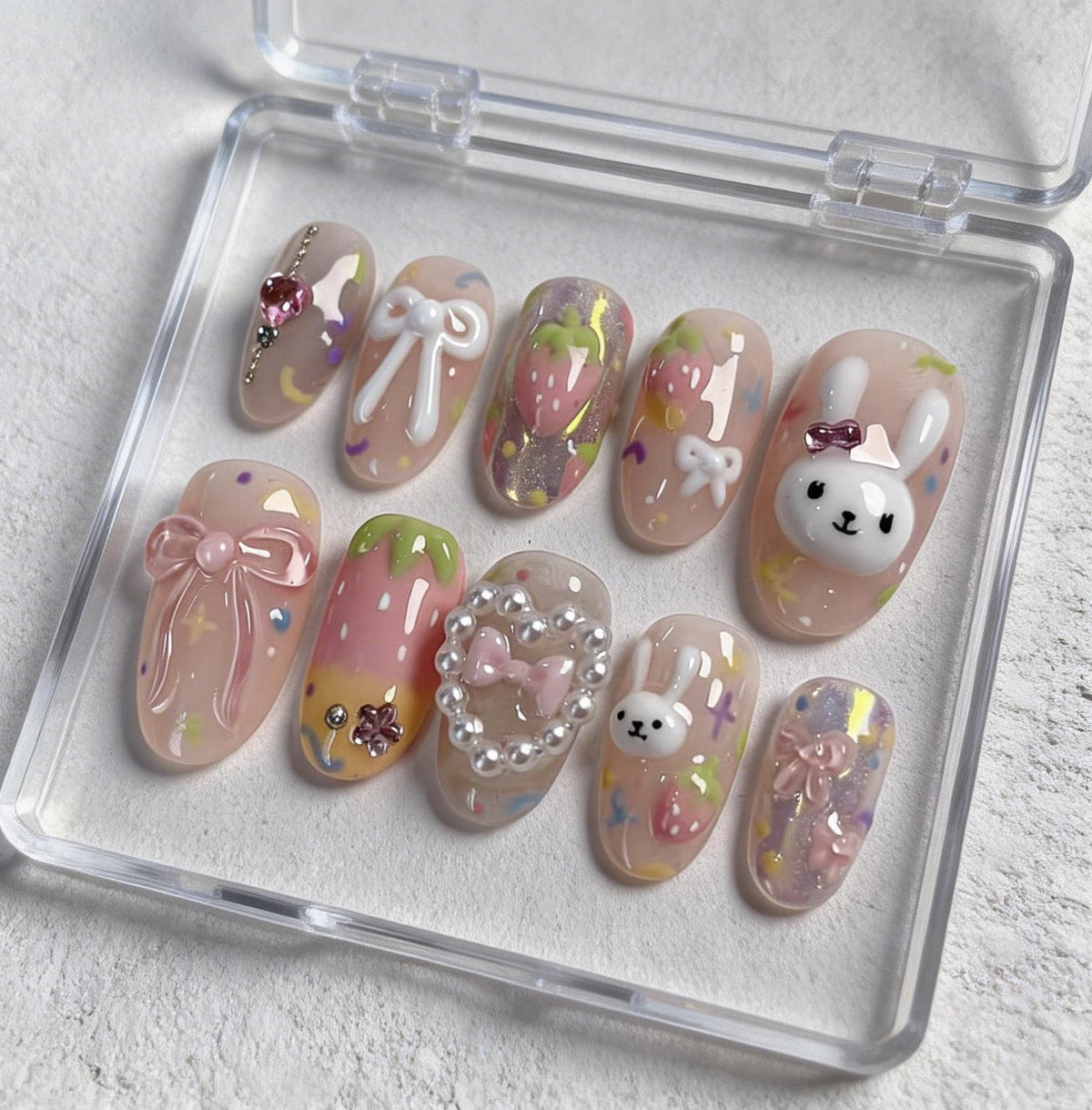 Kawaii Bunny press-on Nails; Strawberry Bow Nails.