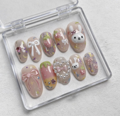 Kawaii Bunny press-on Nails; Strawberry Bow Nails.