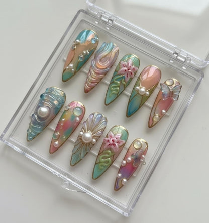 Mermaid Pearl press-on Nails; Pastel Ocean Nails.