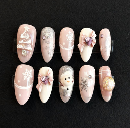 Pink Christmas press-on Nails; Snowflake Winter Nails.