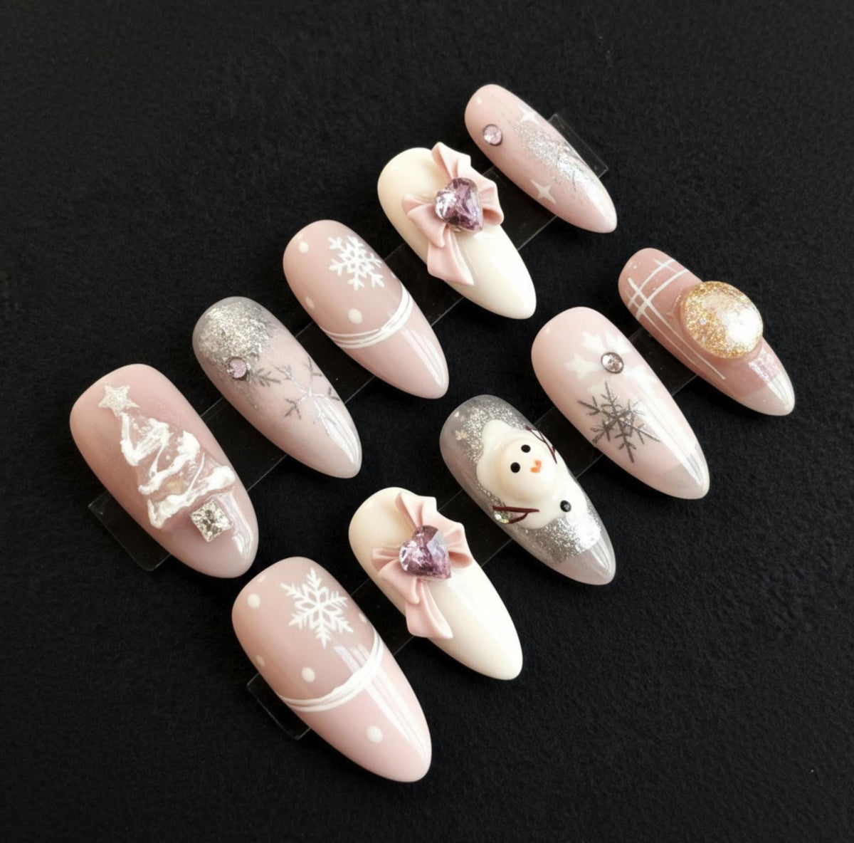 Pink Christmas press-on Nails; Snowflake Winter Nails.