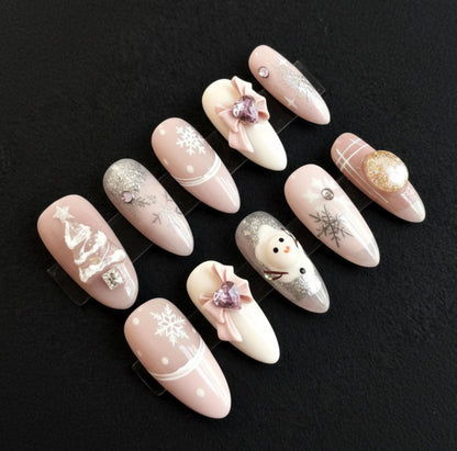 Pink Christmas press-on Nails; Snowflake Winter Nails.