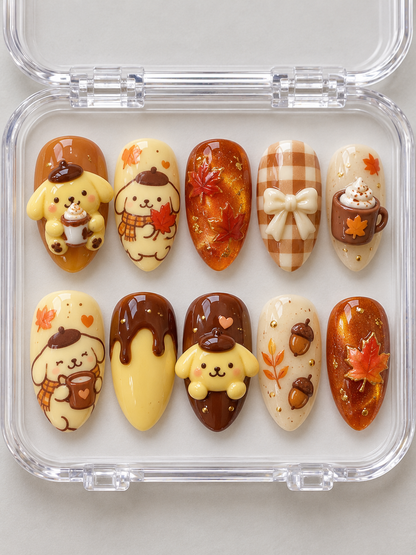 AI design preview: Pompompurin Fall Press-On Nails – Maple Caramel Café; ten nails combining flat 2D character art and sculpted 3D gel details.