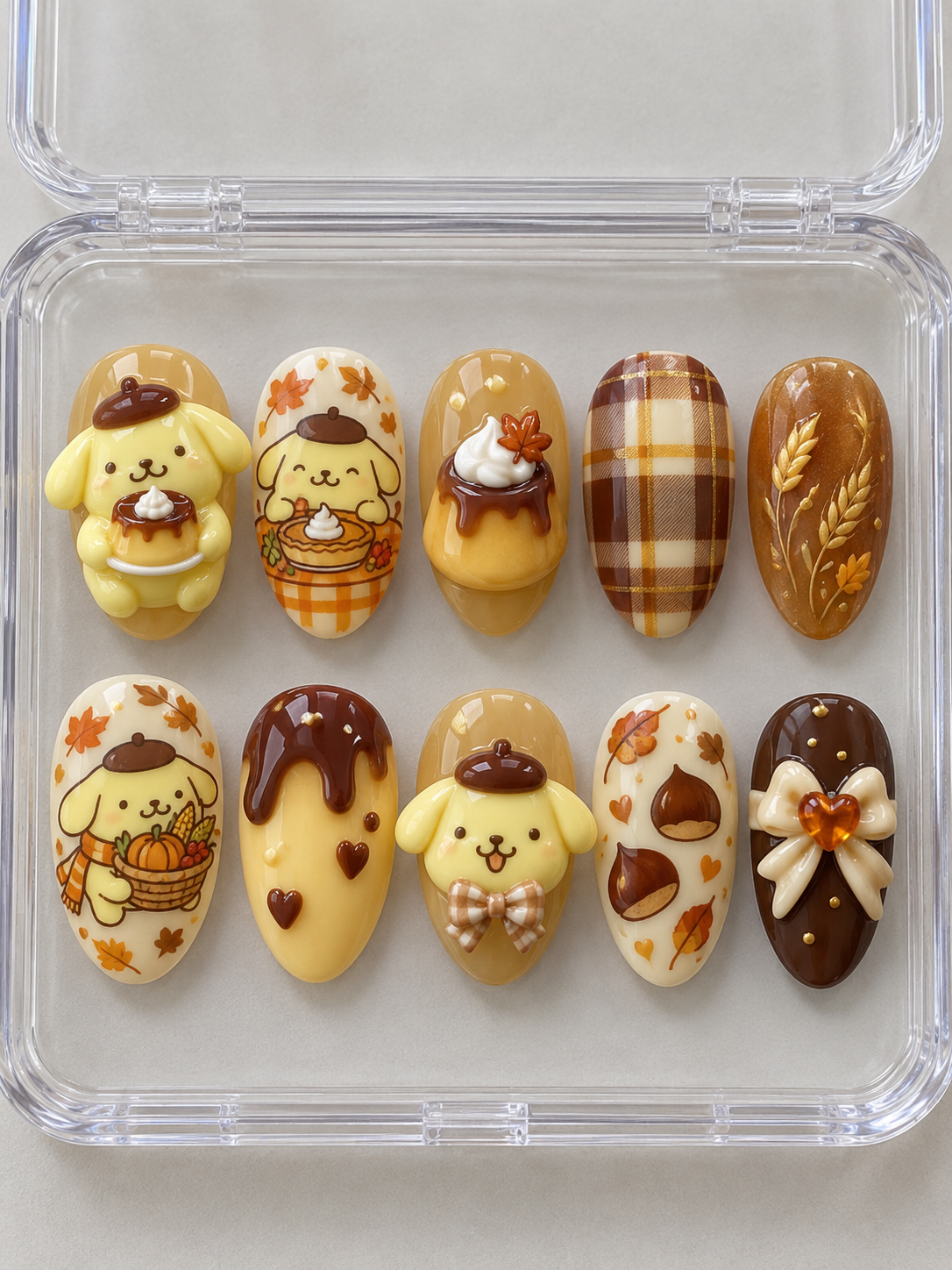 AI design preview: Pompompurin Thanksgiving Press-On Nails – Caramel Friendsgiving Feast; ten nails combining flat 2D character art and sculpted 3D gel details.