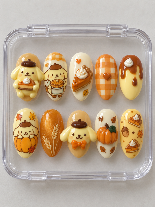 AI design preview: Pompompurin Thanksgiving Press-On Nails – Pumpkin Pie Bakery; ten nails combining flat 2D character art and sculpted 3D gel details.