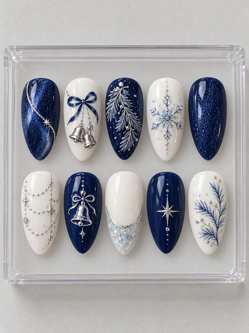 AI design mockup: Ten navy and ivory Christmas press-on nails with silver-colour bells, pine branches, snowflakes and draped accents.