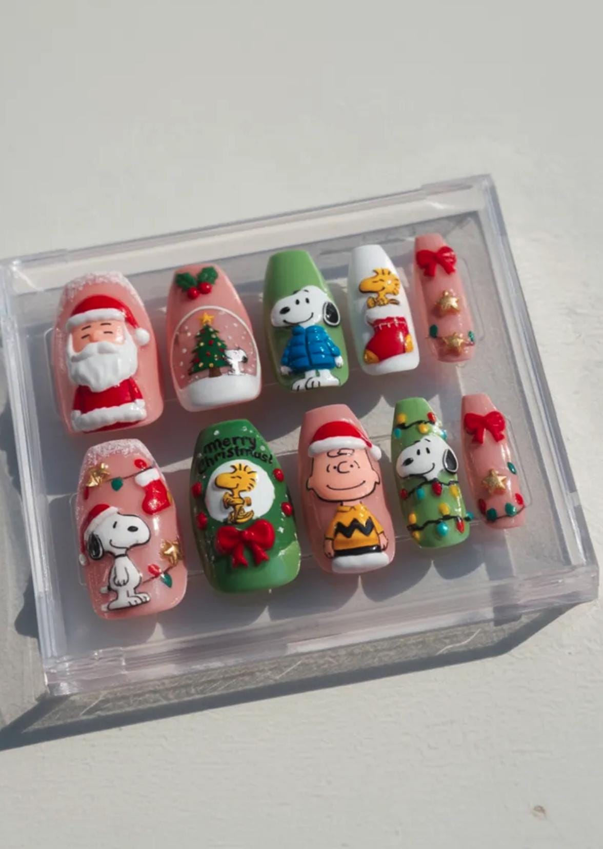 Snoopy Christmas Nails; Handmade 3D Peanuts Holiday press-on Nail Set, Cute Santa and Christmas Tree Nails with Snoopy and Charlie Brown.