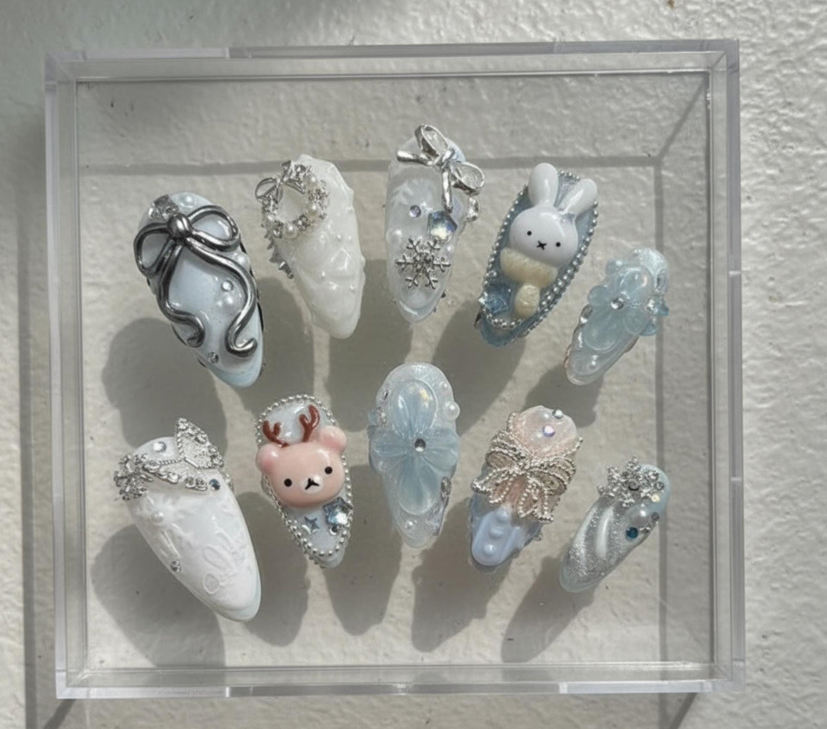 Winter press-on Nails; Ice Blue and Snow White.