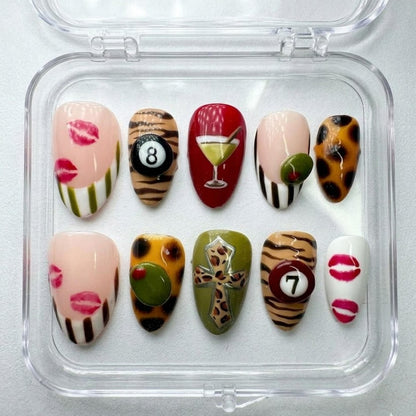 Y2K Glam press-on Nails, Leopard Print Martini Nails, Retro Mixed Design Nails, Lips and 8 Ball Nails, Trendy Almond Nails.
