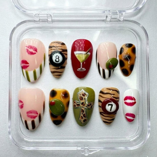 Y2K Glam press-on Nails, Leopard Print Martini Nails, Retro Mixed Design Nails, Lips and 8 Ball Nails, Trendy Almond Nails.