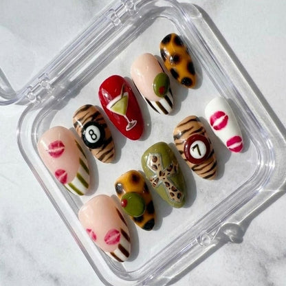 Y2K Glam press-on Nails, Leopard Print Martini Nails, Retro Mixed Design Nails, Lips and 8 Ball Nails, Trendy Almond Nails.